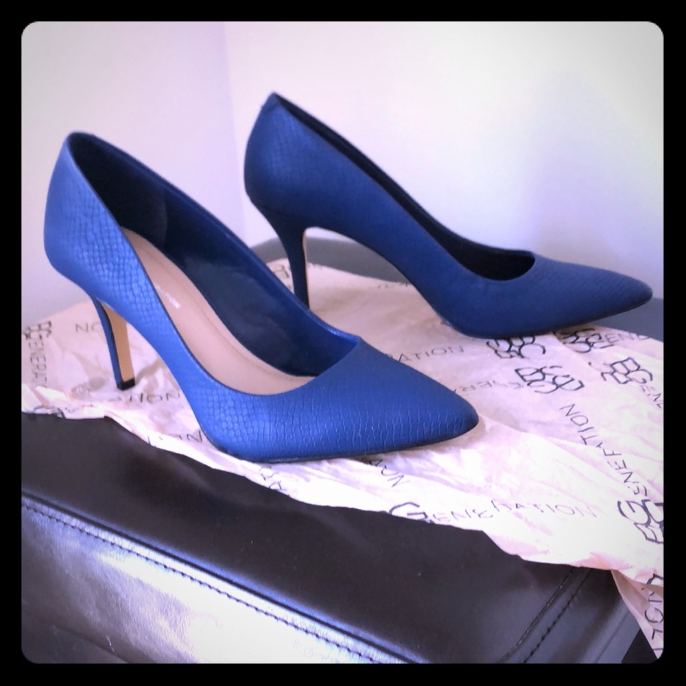 BCBGen. Like New. Worn once. Clean. Blue. Size7.